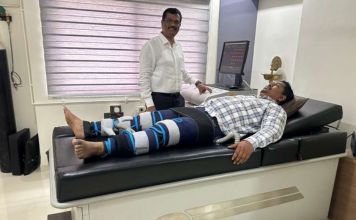 EECP therapy cuffs on patient’s legs improving heart blood flow